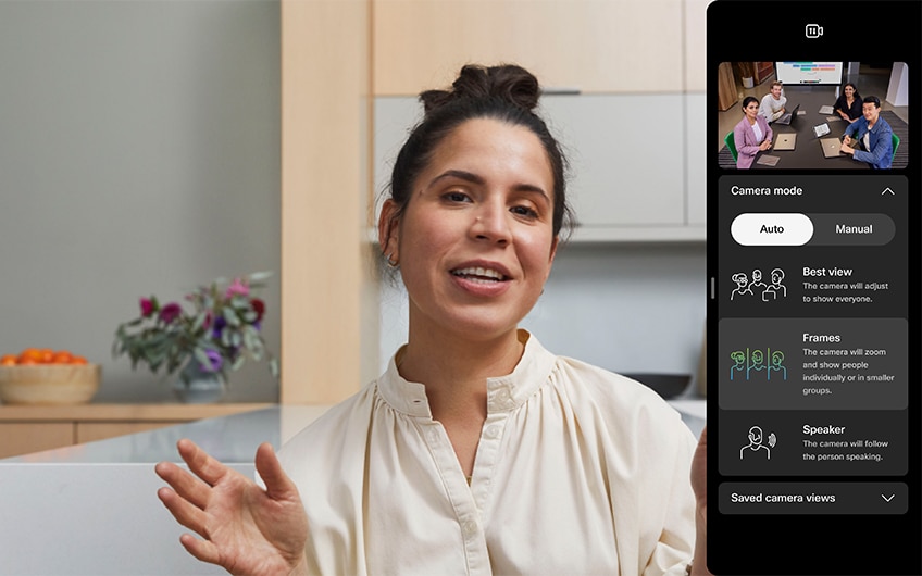 Remote worker speaks to her in-office teammates using Frames view option during Webex video conference.